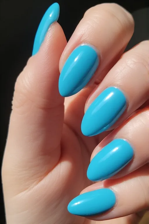  aqua blue glossy almond nails