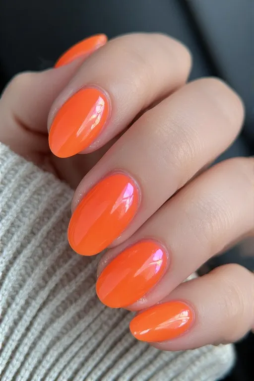 neon orange glazed oval nails