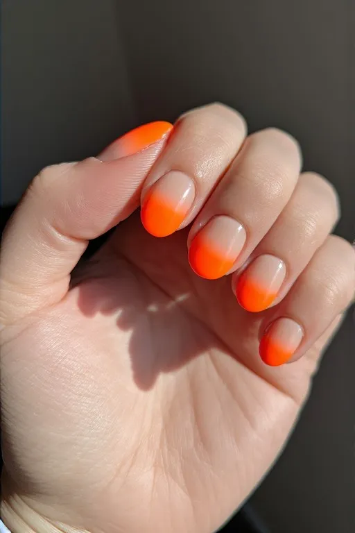 neon orange ombre oval nails