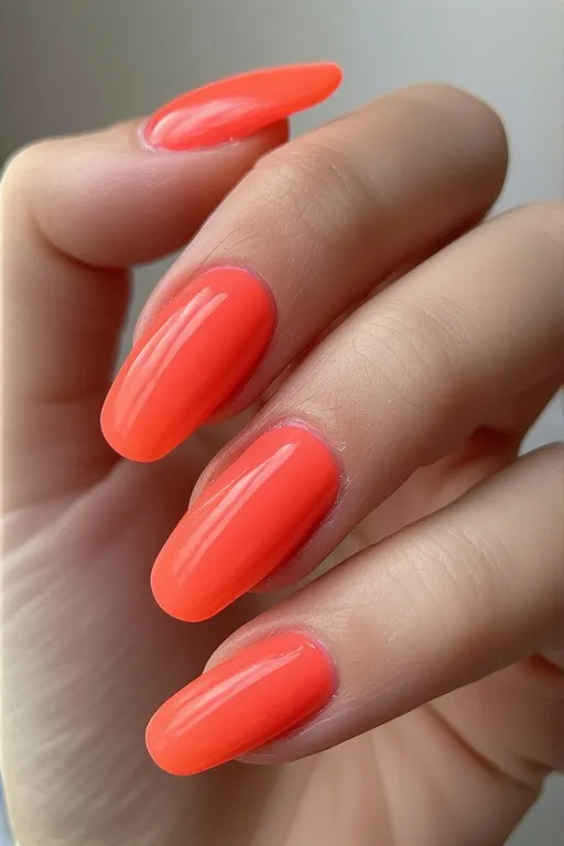 neon coral glazed oval nails