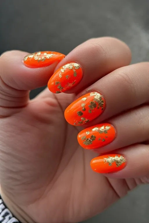 neon orange gold foil accent oval nails