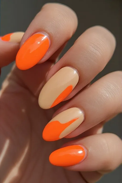 neon orange nude color block oval nails
