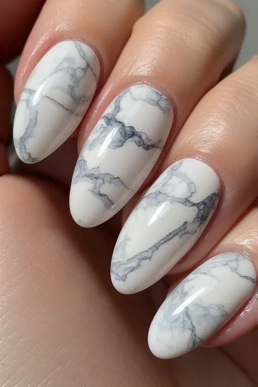 white marble almond nails with grey veining