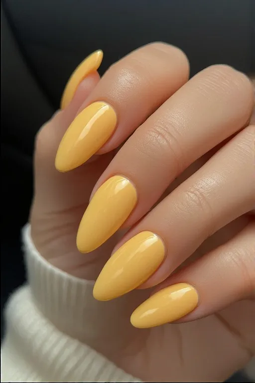  butter yellow glossy almond nails