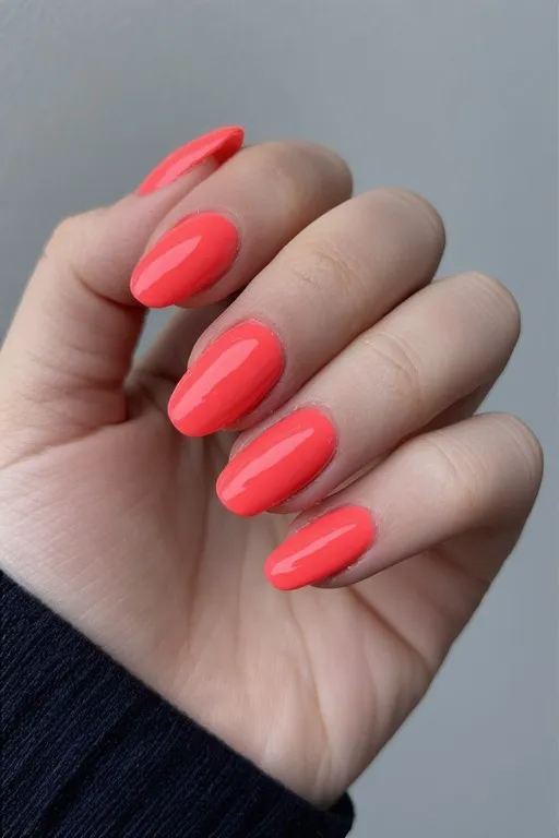  warm coral glossy almond nails