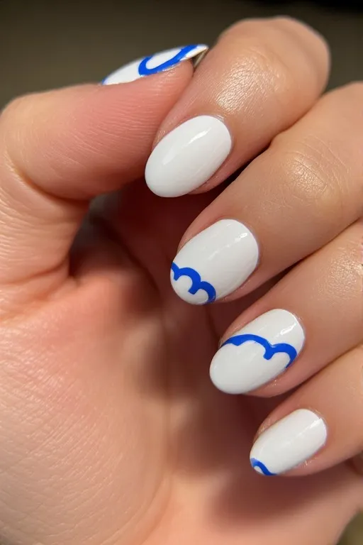 blue-and-white-nails-white-blue-wave.jpg white nails with blue wave nail art