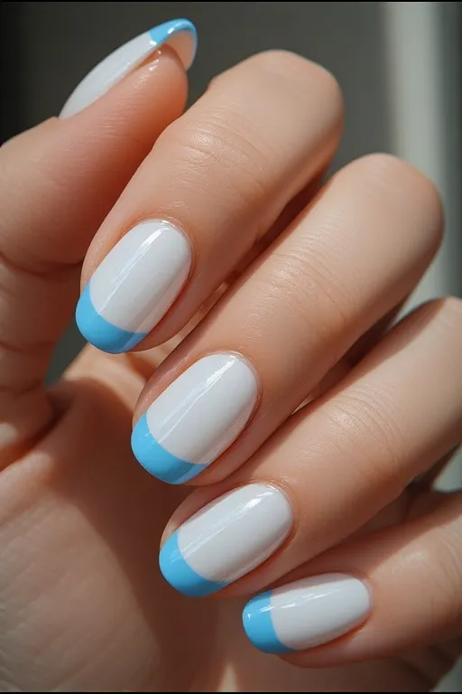 white base nails with blue french tip