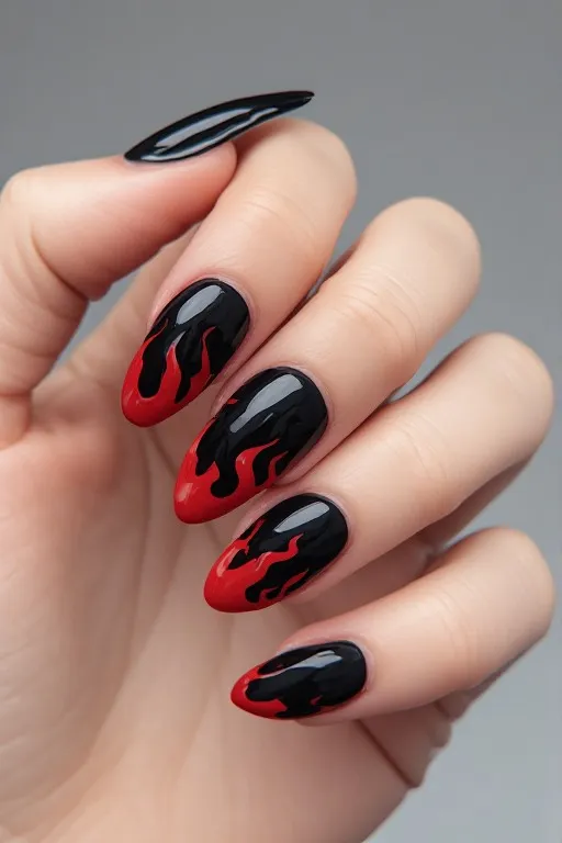 black nails with red flame tips stiletto