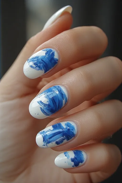white nails with abstract blue nail art