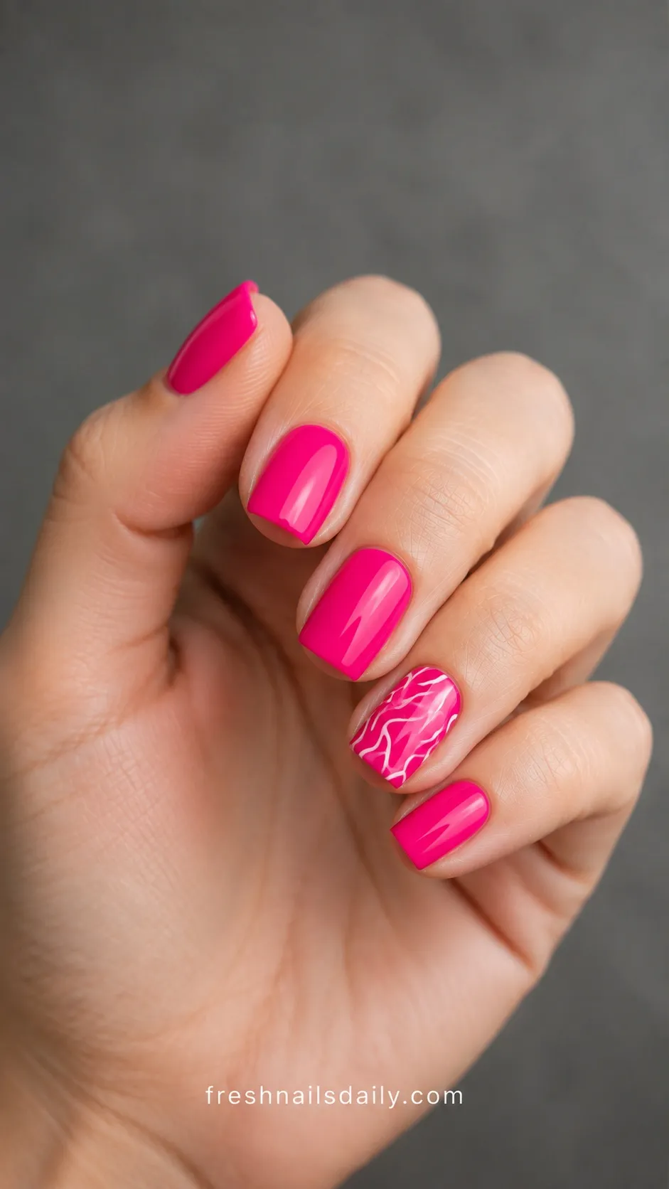 hot pink short square nails with white squiggly lines